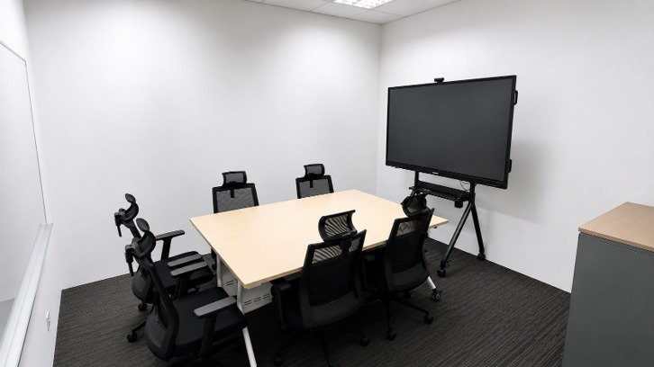Huddle room with a display screen